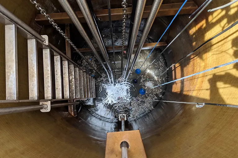 Inside the Ramingining FRP pump station after more than 20 years in service, with stainless steel guide rails and pipework